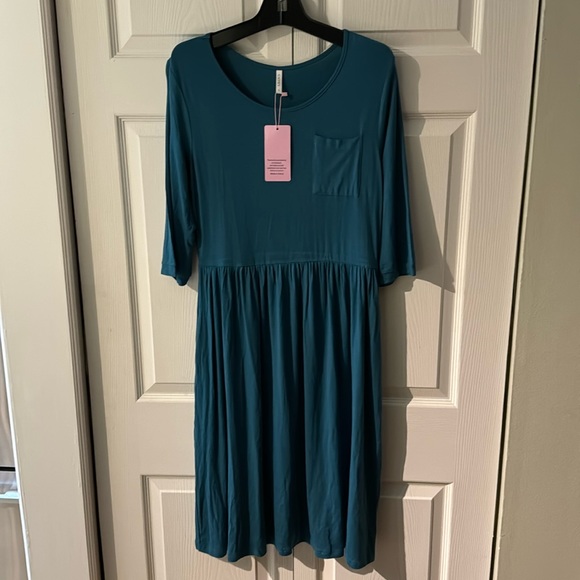 Beautiful and elegant basic with pocket dress Cathy size large color blue Cathy - Picture 1 of 4